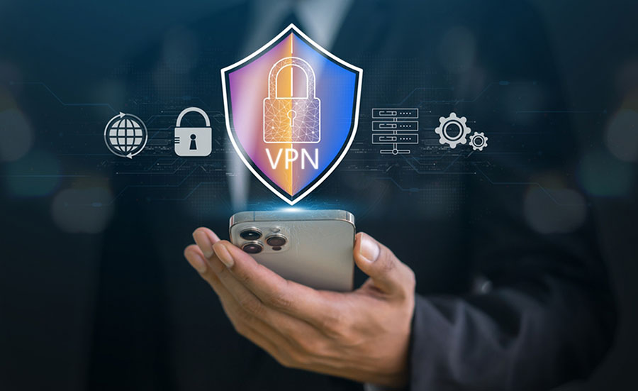 Main avec un Iphone et un icone avec un VPN 